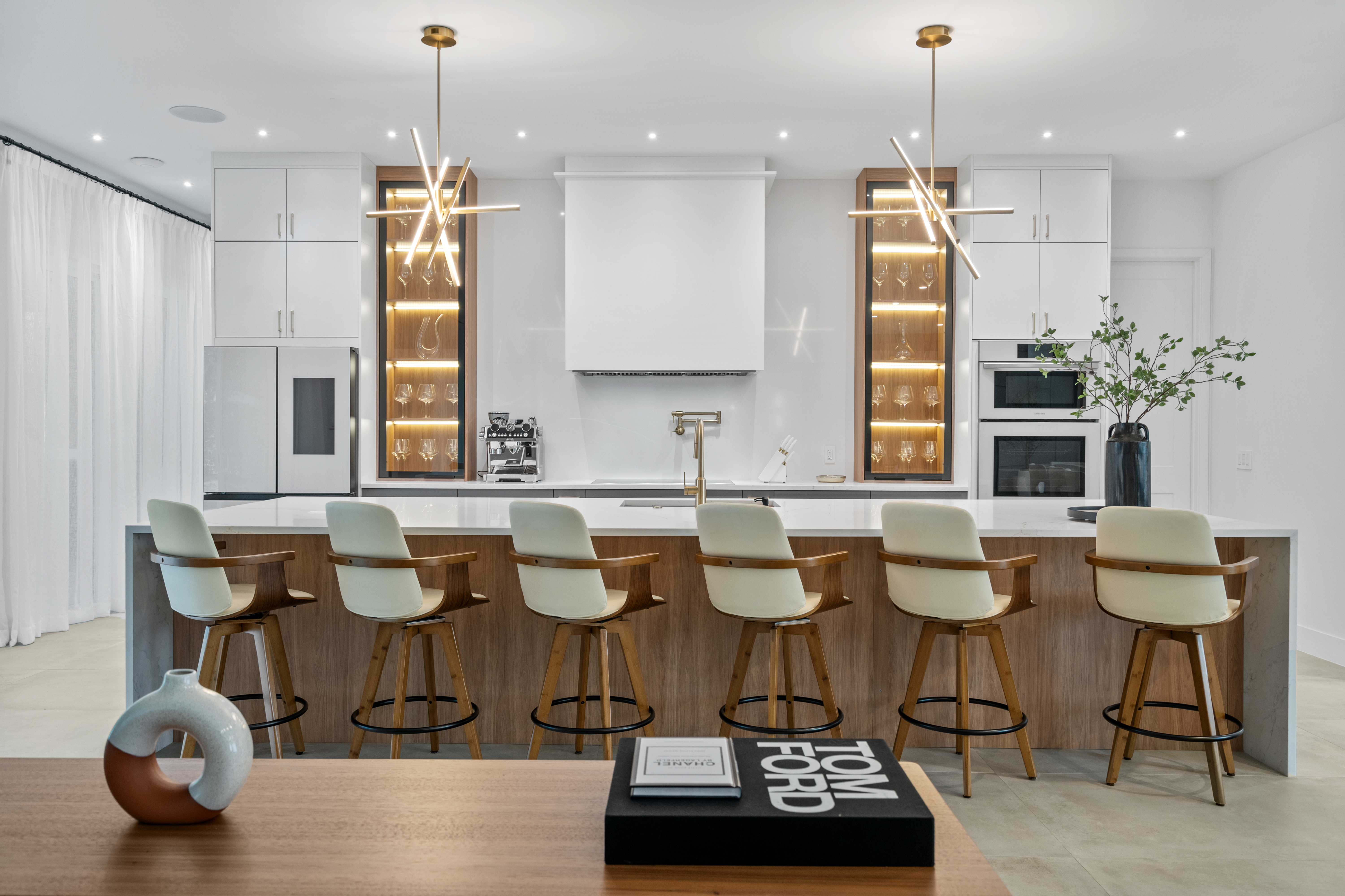 Refined kitchen with custom cabinetry