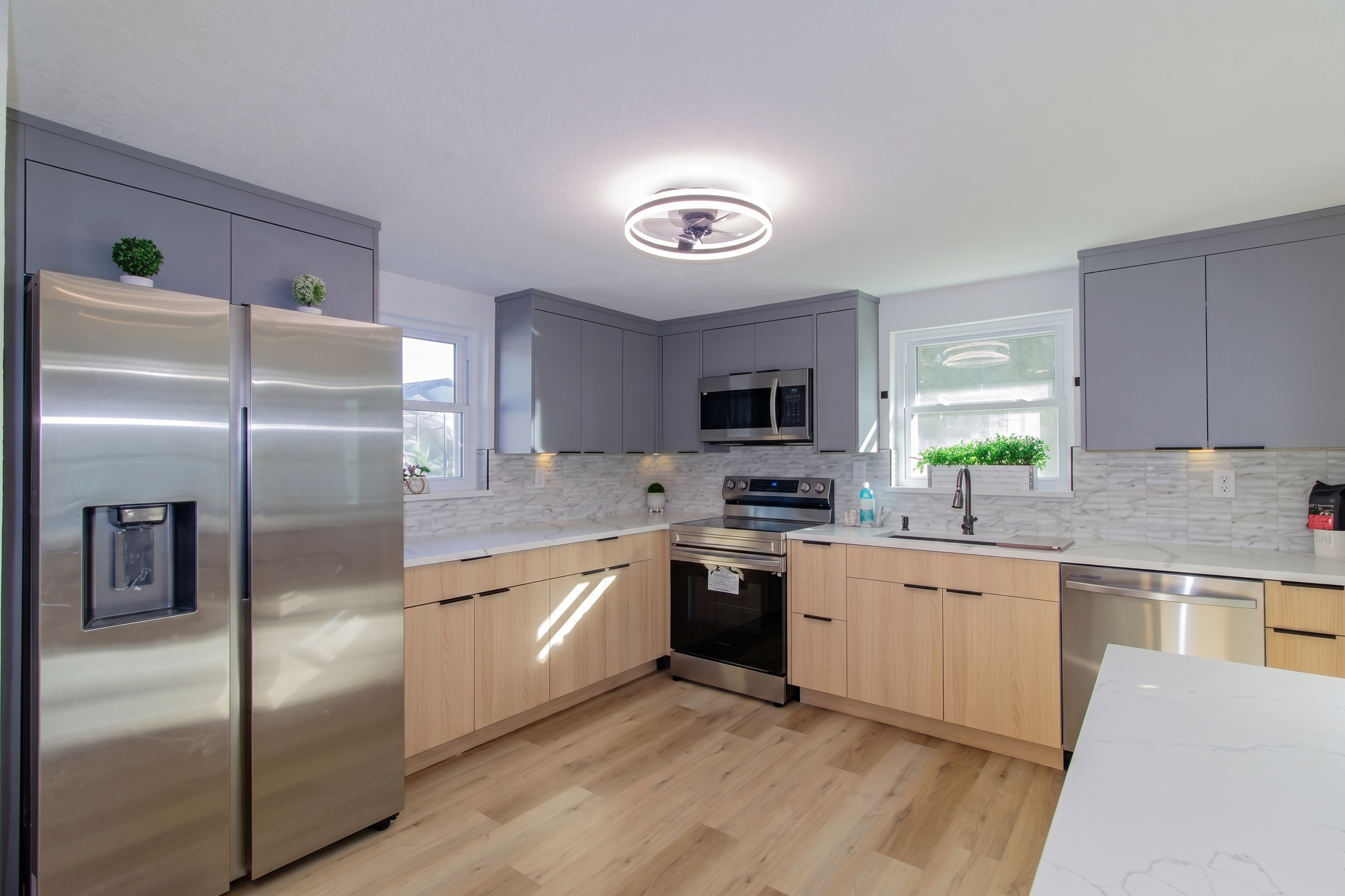 Refined kitchen with custom cabinetry