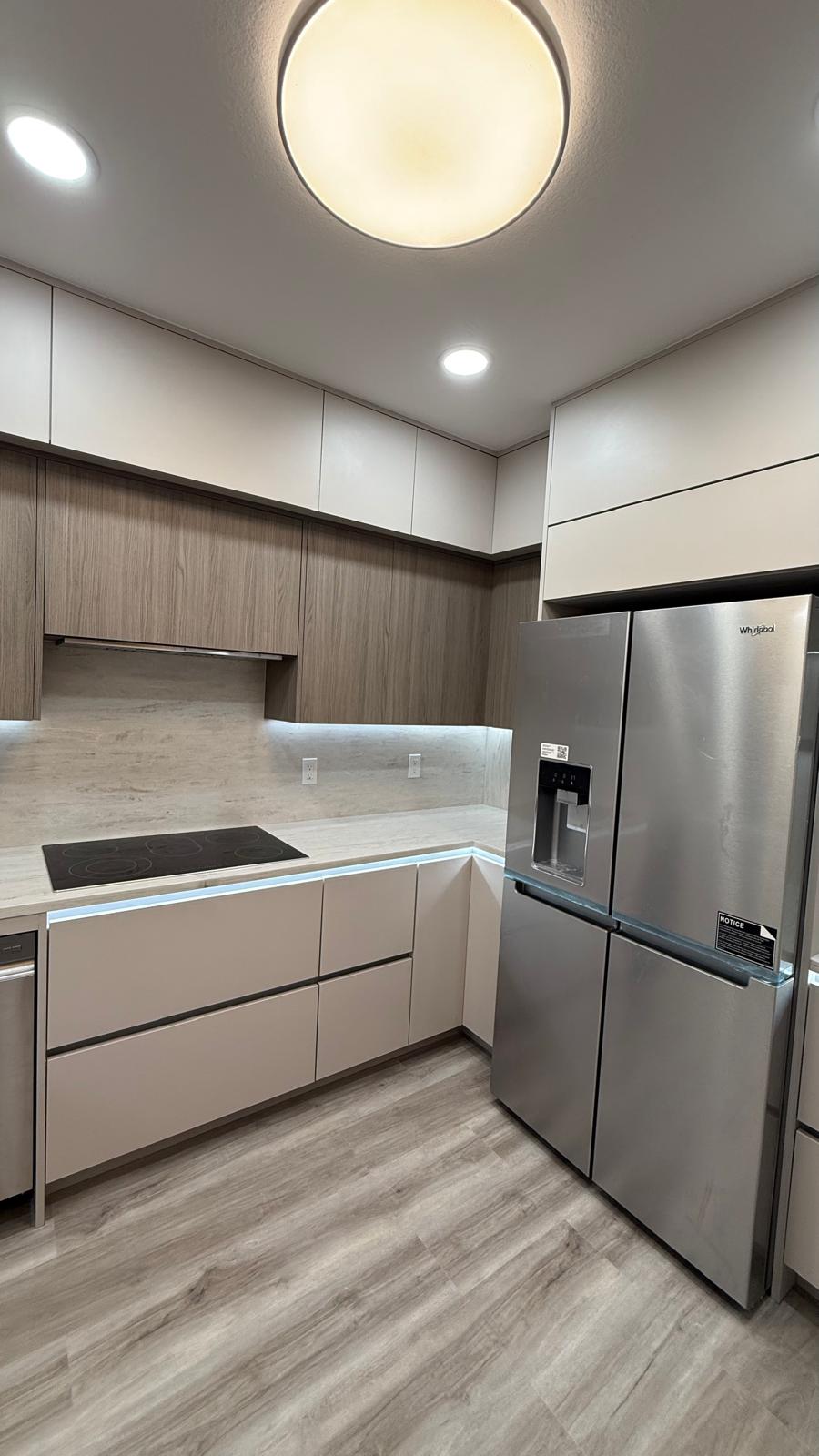 Refined kitchen with custom cabinetry