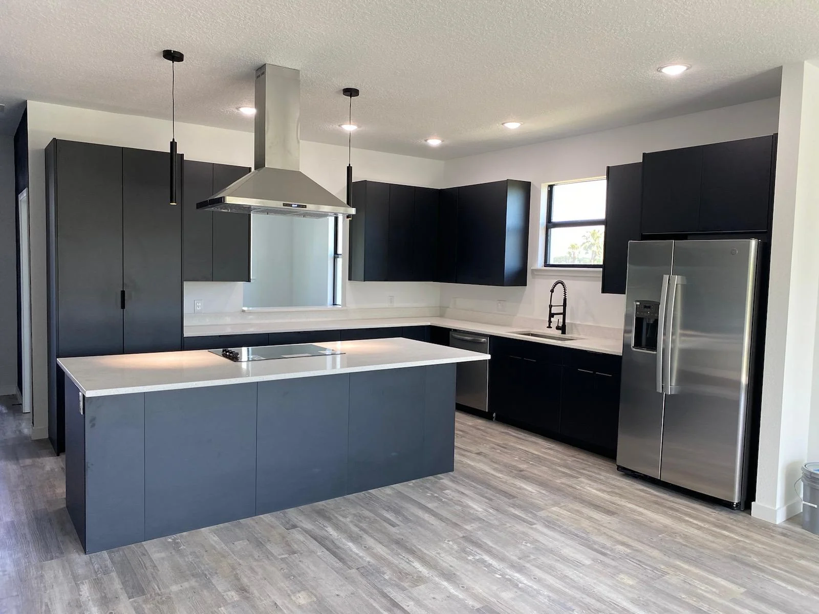 Refined kitchen with custom cabinetry