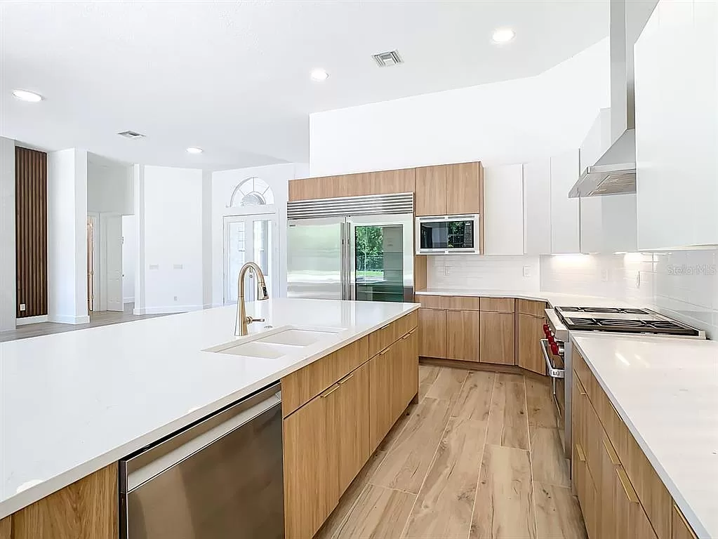 Refined kitchen with custom cabinetry
