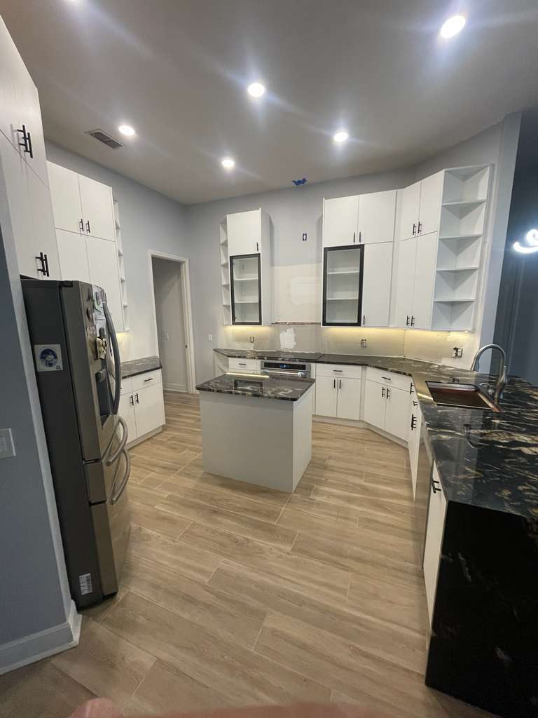 Refined kitchen with custom cabinetry