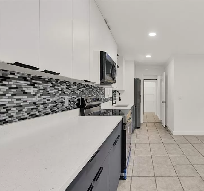 Refined kitchen with custom cabinetry