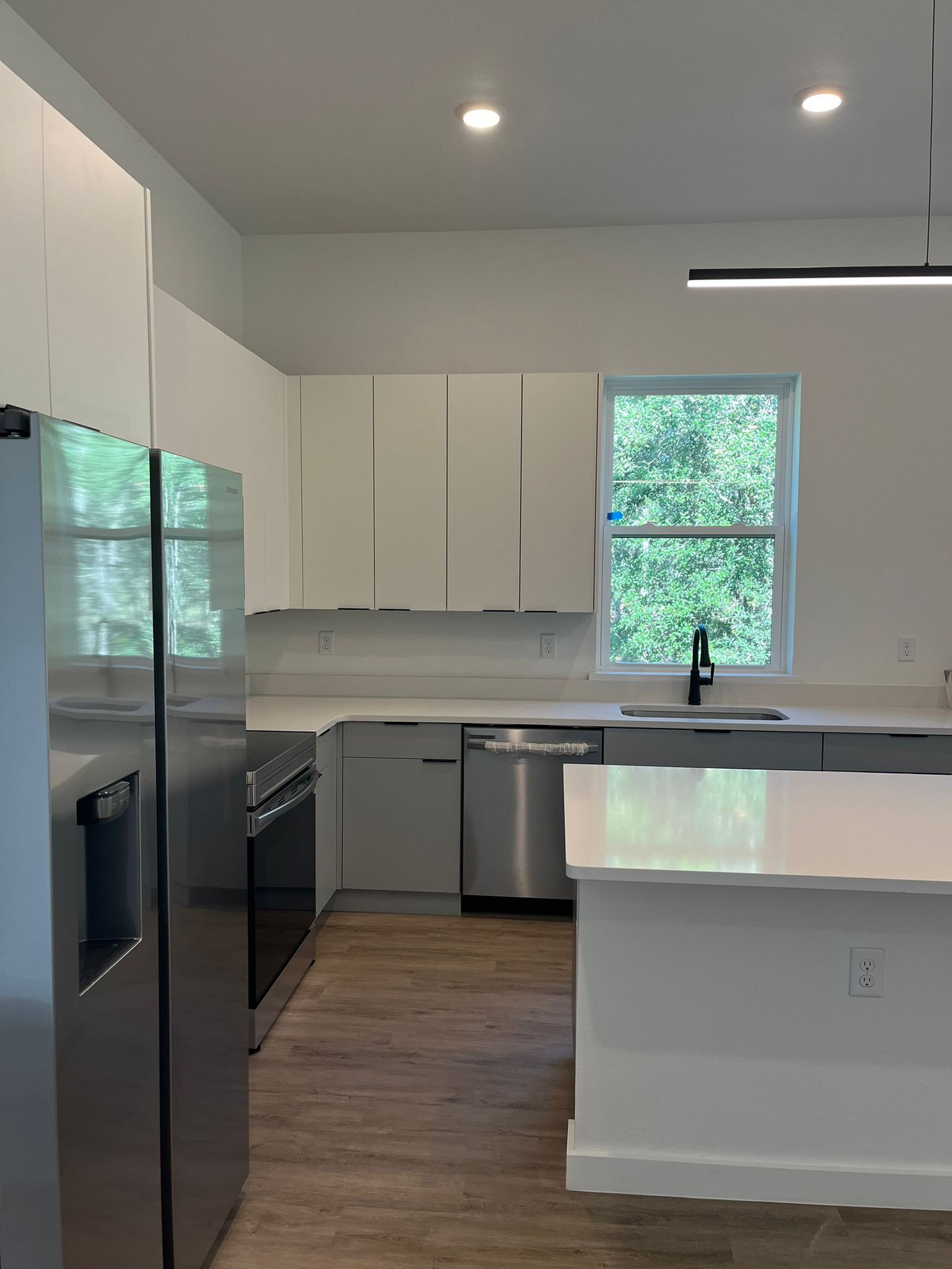 Refined kitchen with custom cabinetry